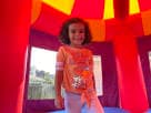 Perfect for Houston kids' parties, this Disney-licensed Toy Story 4 carousel bounce house rental features vibrant red and orange