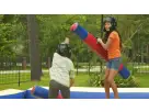 Joust interactive game rental in Austin with padded jousting poles, ideal for Pflugerville teenager parties.