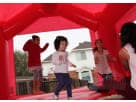 Hello Kitty bounce house rental in Dallas with covered sides and safety netting, ideal for birthday parties in Mesquite.