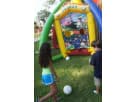 Sports-themed bounce house rental in Dallas with six interactive games, perfect for McKinney birthday parties and large events.