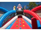 Justice League obstacle course rental in Austin with dual slides, rock wall, and pop-ups—ideal for Georgetown birthday parties