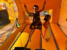 Perfect for Austin birthday parties, this Ice Cream Truck bounce house rental keeps kids entertained indoors with bright orange
