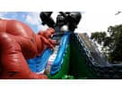 Dinosaur obstacle course with 43-foot double slide available for rental in Austin, perfect for Cedar Park kids' parties ages 3