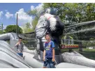 Renta de castillo inflable King of the Moon Adventure con diseño de astronauta, ideal para fiestas en Pearland.