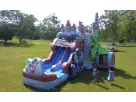 Perfect for Cypress birthday parties, this Knights & Dragons Castle bounce house rental in Houston features wet or dry water