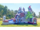 Knights & Dragons Castle bounce house rental in Houston with dual water slides, ideal for wet or dry play at The Woodlands
