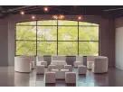 Cream lounge furniture booth with square ottoman set for 16 guests, ideal for elegant Houston event rentals in Pasadena.