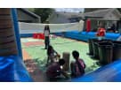 Blue and red modular obstacle course rental in Austin with tunnels and climbing sections, ideal for Leander birthday parties
