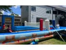 Themed inflatable obstacle course rental in Austin with vibrant sections perfect for Pflugerville backyard celebrations.