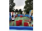 Lawn games rental in Austin with cornhole and obstacle course stations—ideal for Leander backyard parties.