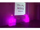Neon pink LED cube seating rental in Houston perfect for lounge décor and modern event lighting with glowing accent spheres.