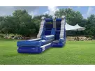 Dual-slide water slide rental in Austin with castle towers, perfect for Round Rock summer parties and events.