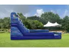 Perfect for Austin pool parties, this blue water slide rental features a stepped climbing wall and extended landing pool