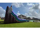 Backyard Water Slide for Rent next to a pool