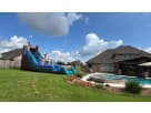 21ft Wild Rapids Water Slide rental in Dallas with adventure-themed design — perfect for Arlington summer parties.