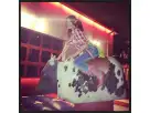 Girl Riding Mechanical Bull