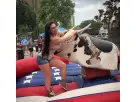Perfect for Dallas events, this mechanical bull rental holds up to 30 riders per hour with real cowhide construction