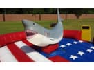 Red, white, and blue shark bounce house rental in Dallas brings festive fun to Frisco parties and family gatherings.