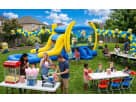 Minions bounce house rental in Dallas with dual slides — ideal for Garland birthday parties and backyard fun.