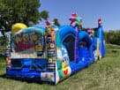 Perfect for League City parties, this 50ft Minions obstacle course rental in Houston features slides and climbing walls