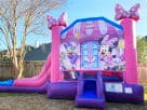 Minnie Mouse bounce house with wet or dry slide rental in Houston, ideal for Katy birthday parties with castle towers and polka