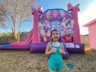 Pink and purple Minnie Mouse bounce house with wet or dry slide rental in Houston, ideal for Pearland birthday parties.