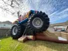 Monster Truck Deluxe bounce house rental in Houston with climb and slide — ideal for The Woodlands birthday parties.