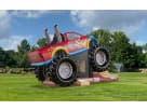 Monster Truck Deluxe bounce house rental in Houston with large bouncing area and slide, ideal for Pearland birthday parties.