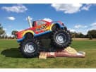 Perfect for Dallas birthday parties, this monster truck bounce house rental features a large bouncing area with realistic tires