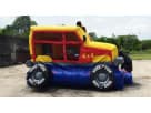 Monster truck bounce house rental in Houston with slide — ideal for Spring parties and kids of all ages.
