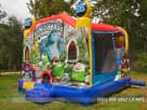 Monsters Inc. themed bounce house with wet or dry water slide option, set up in a Houston backyard—ideal for Pearland party