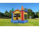 Colorful castle bounce house rental in Dallas with bright yellow, red, and blue design—ideal for Irving birthday parties.