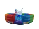 Perfect for Houston kids' parties, this mechanical rainbow shark rental features an interactive bucking design that keeps guests