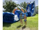 Perfect for Houston summer parties, this 60ft water slide rental features thrilling Niagara Falls action with dual lanes