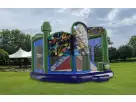 Ninja Turtles 5in1 bounce house rental in Dallas with wet or dry slide, ideal for Irving birthday parties.