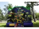 Teenage Mutant Ninja Turtles bounce house rental in Houston featuring a wet/dry water slide combo, perfect for Cypress birthday