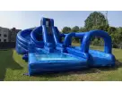 Perfect for Dallas water parties, the Triple Ocean Helix dual lane slide rental features dual slides with slip-n-slide action