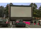 Pantalla inflable para cine al aire libre con proyector incluido, ideal para fiestas en Austin y Kyle.