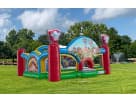 Bright princess bounce house rental in Dallas featuring red, blue, and green castle details, ideal for Irving birthday parties.