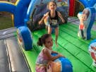 Paw Patrol toddler bounce house rental in Dallas features vibrant character cutouts perfect for McKinney outdoor events.