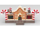 Gingerbread Wonder Playland bounce house with candy cane pillars available for rental in Dallas—perfect for indoor or outdoor