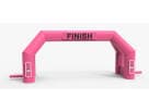 Arco inflable rosa para meta de carrera en renta en Houston, ideal para fiestas en The Woodlands.