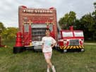 Fire station bounce house rental in Houston with wet or dry slide option—ideal for Cypress birthday parties.