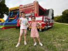 Fire truck bounce house with water slide rental in Houston—wet or dry combo ideal for Kingwood birthday parties.