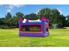 Perfect for toddler parties, this pink and purple castle bounce house rental in Austin features a compact indoor/outdoor design