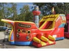 Renta de barco pirata inflable en Austin con tobogán y pared de escalada, ideal para fiestas de niños desde los 3 años.