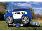 Renta de casa inflable con tema policial en Austin con diseño de patrulla y ruedas detalladas, ideal para fiestas en Cedar Park.