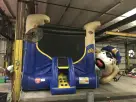 Police Dog Paw Patrol bounce house rental in Austin with front-facing slide, ideal for Leander kids' parties.