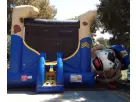Police Dog Paw Patrol bounce house rental in Austin with front slide, ideal for Buda birthday parties.