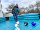 Giant turquoise billiards soccer interactive bounce house rental in Houston, perfect for backyard parties with dual-game play